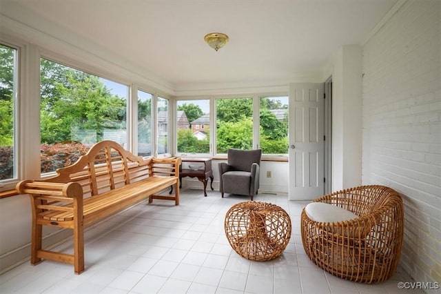 3204 Griffin Ave, Richmond, VA 23222 - sunroom featuring tile patterned flooring and brick wall