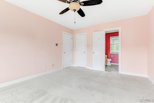 9214 Hunters Chase Dr, Mechanicsville, VA 23116 - unfurnished bedroom with light colored carpet, baseboards, ensuite bath, and a ceiling fan