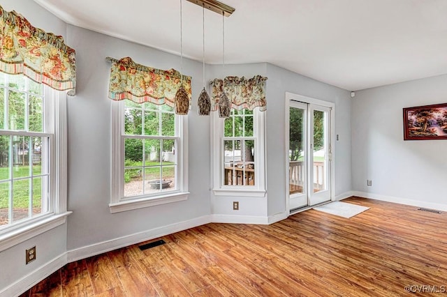 9214 Hunters Chase Dr, Mechanicsville, VA 23116 - unfurnished dining area featuring light wood-style flooring and baseboards