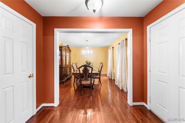 6207 Hackney Loop, Chesterfield, VA 23234 - dining room featuring baseboards, a chandelier, and dark wood finished floors