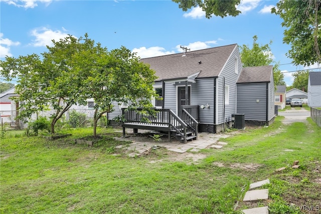 327 S 12th Ave, Hopewell, VA 23860 - back of house featuring a deck, roof with shingles, and central AC