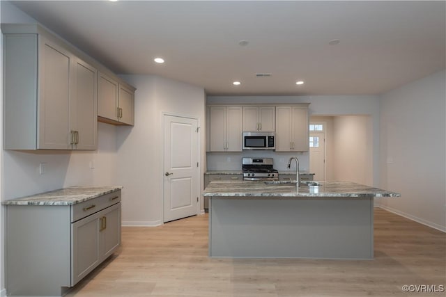 000 Stavely Rd, Chester, VA 23831 - kitchen with appliances with stainless steel finishes, gray cabinets, baseboards, light wood finished floors, and recessed lighting