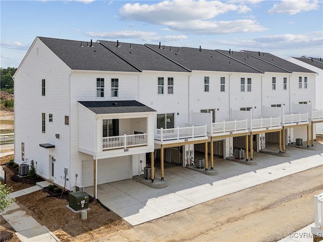 15355 Sunray Way, Chesterfield, VA 23832 - rear view of property with an attached garage, central air condition unit, concrete driveway, and a residential view