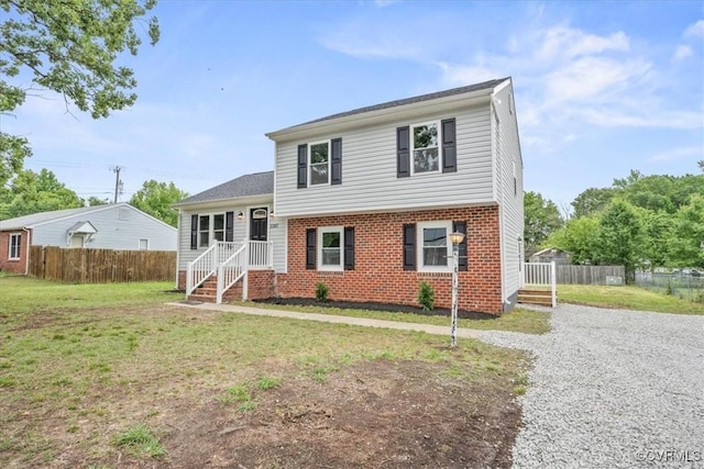3207 Mark Rd, Richmond, VA 23234 - split level home with brick siding and gravel driveway