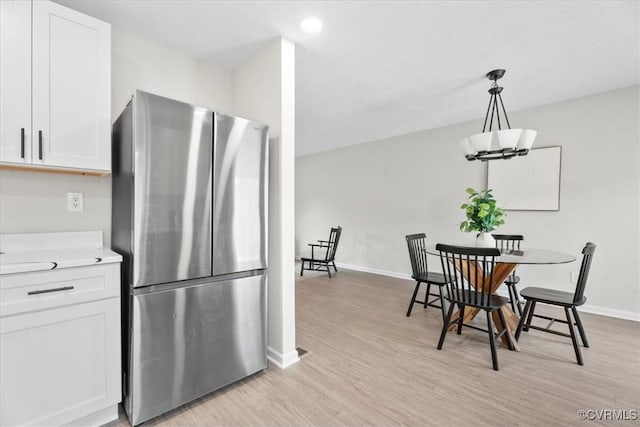 3207 Mark Rd, Richmond, VA 23234 - dining room featuring light wood-style floors, baseboards, and recessed lighting