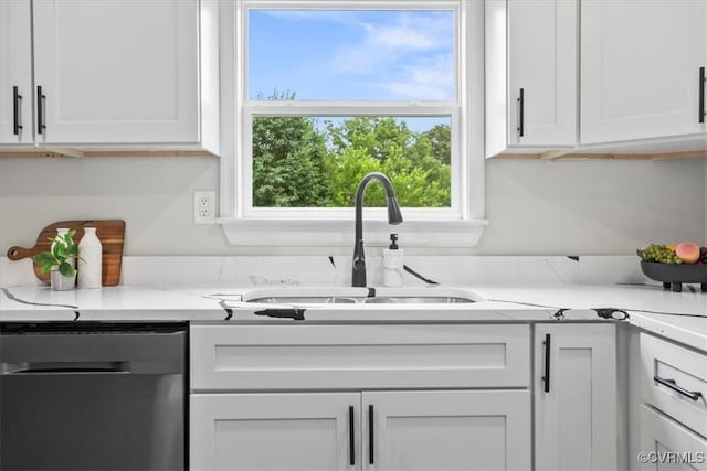 3207 Mark Rd, Richmond, VA 23234 - kitchen featuring dishwashing machine, a sink, white cabinetry, and light countertops