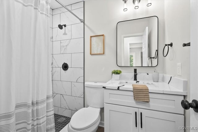 3207 Mark Rd, Richmond, VA 23234 - bathroom featuring vanity, toilet, and tiled shower