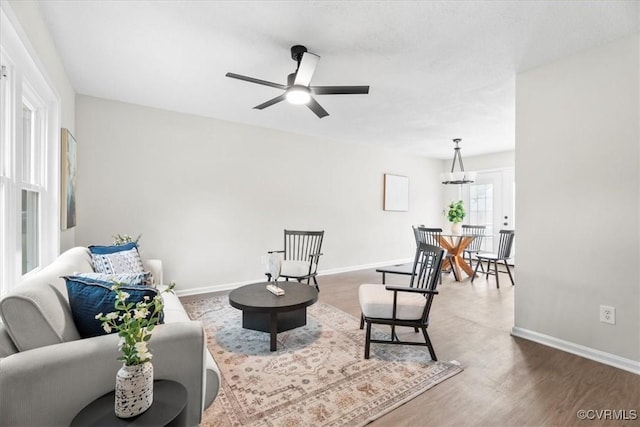 3207 Mark Rd, Richmond, VA 23234 - living room featuring wood finished floors, ceiling fan, and baseboards