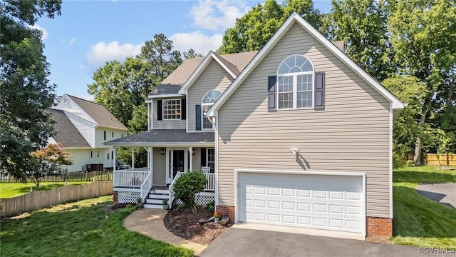 3724 Liberty Point Dr, Midlothian, VA 23112 - traditional-style home with a porch, a garage, asphalt driveway, and roof with shingles