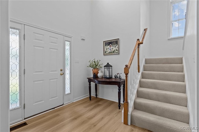 3724 Liberty Point Dr, Midlothian, VA 23112 - entryway with light wood finished floors and stairs