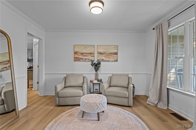 3724 Liberty Point Dr, Midlothian, VA 23112 - living area featuring light wood-type flooring, ornamental molding, and plenty of natural light