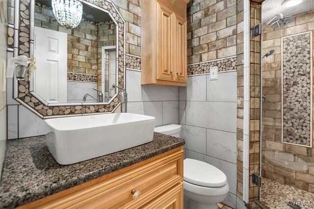 1146 Wicker Dr, Colonial Heights, VA 23834 - full bathroom with toilet, tile walls, a shower stall, and vanity