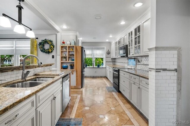 1146 Wicker Dr, Colonial Heights, VA 23834 - kitchen with stainless steel appliances, inlaid floor details, a sink, decorative backsplash, and recessed lighting