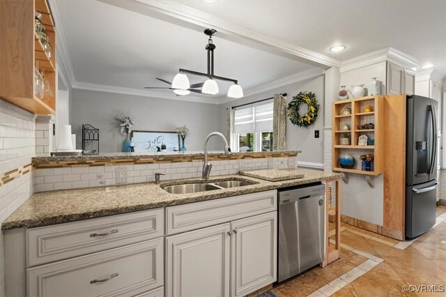 1146 Wicker Dr, Colonial Heights, VA 23834 - kitchen with stainless steel dishwasher, a sink, ornamental molding, tasteful backsplash, and inlaid floor details