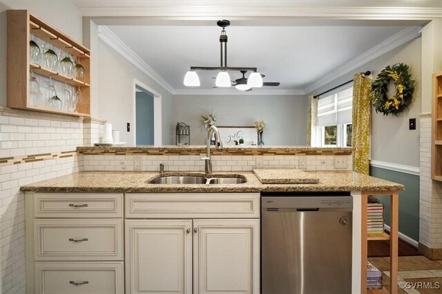 1146 Wicker Dr, Colonial Heights, VA 23834 - kitchen featuring stainless steel dishwasher, a sink, light stone counters, tasteful backsplash, and cream cabinetry