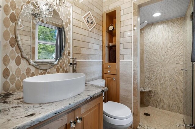 1146 Wicker Dr, Colonial Heights, VA 23834 - full bathroom with toilet, a stall shower, vanity, and tile walls