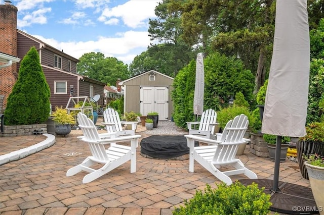 1146 Wicker Dr, Colonial Heights, VA 23834 - view of patio / terrace featuring an outdoor fire pit