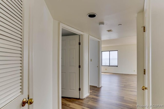 7505 River Rd Unit 4D, Newport News, VA 23607 - corridor featuring wood finished floors and baseboards