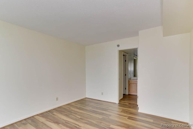 7505 River Rd Unit 4D, Newport News, VA 23607 - empty room with light wood-style floors and baseboards