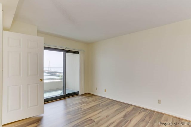 7505 River Rd Unit 4D, Newport News, VA 23607 - unfurnished room featuring light wood-style flooring and baseboards
