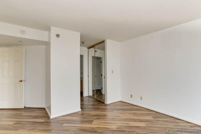 7505 River Rd Unit 4D, Newport News, VA 23607 - unfurnished room featuring wood finished floors and baseboards