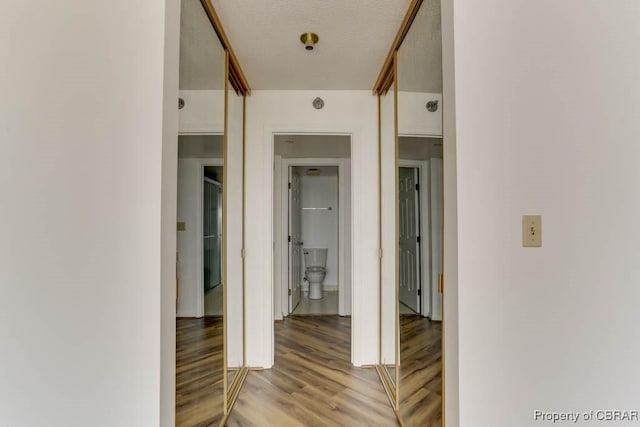 7505 River Rd Unit 4D, Newport News, VA 23607 - hall with light wood-type flooring and baseboards
