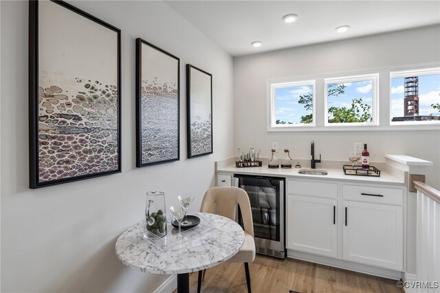 5429 Gillies Creek Mews, Henrico, VA 23231 - indoor wet bar featuring wine cooler and light wood-type flooring