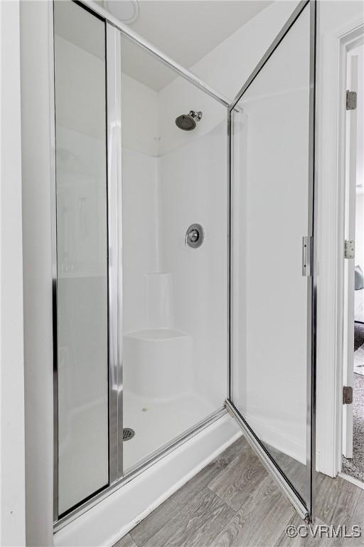 8412 Morocco Pl, Moseley, VA 23832 - full bathroom featuring wood finished floors and a shower stall