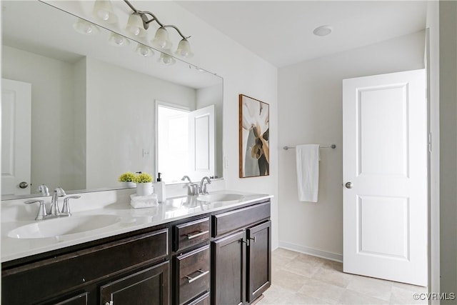 8412 Morocco Pl, Moseley, VA 23832 - bathroom with double vanity and tile patterned floors