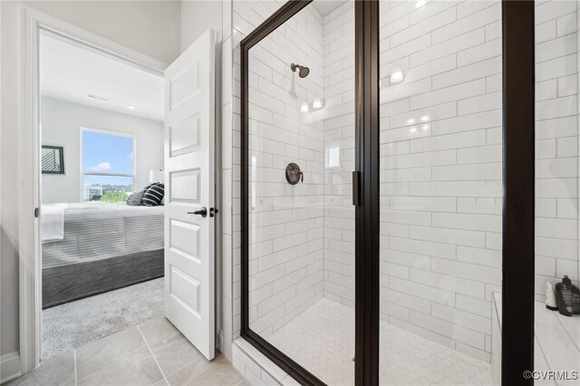 5427 Gillies Creek Mews, Henrico, VA 23231 - bathroom featuring a shower stall, tile patterned flooring, and connected bathroom