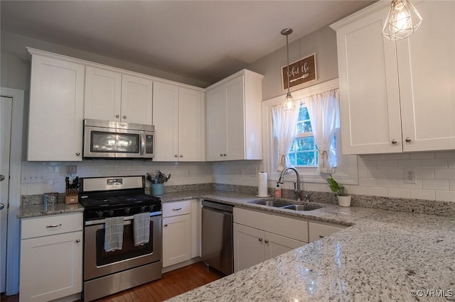 9604 Weston Ln, Henrico, VA 23238 - kitchen featuring stainless steel appliances, a sink, and white cabinets