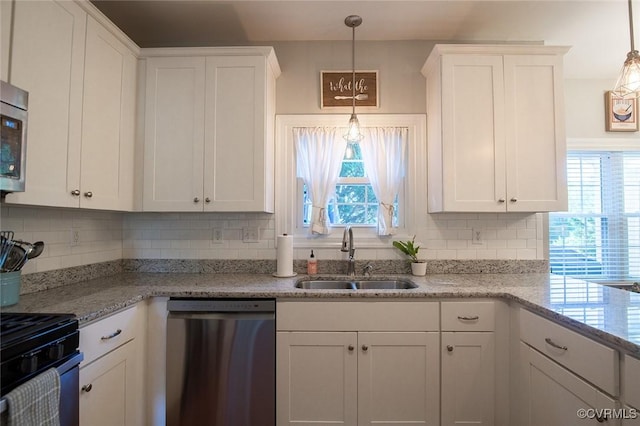 9604 Weston Ln, Henrico, VA 23238 - kitchen with stainless steel dishwasher, a sink, white cabinets, backsplash, and decorative light fixtures