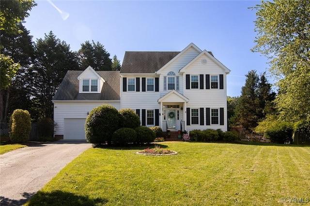 9604 Weston Ln, Henrico, VA 23238 - colonial inspired home with asphalt driveway, a garage, and roof with shingles