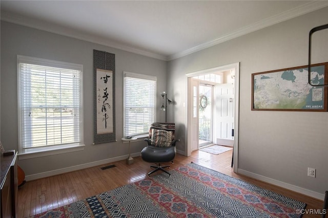 9604 Weston Ln, Henrico, VA 23238 - sitting room with wood finished floors, crown molding, and baseboards
