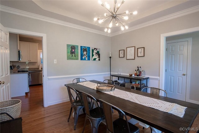9604 Weston Ln, Henrico, VA 23238 - dining area with a chandelier, wood finished floors, crown molding, and baseboards