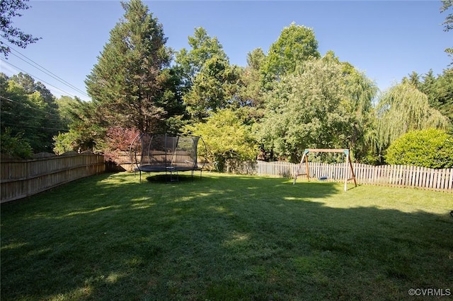 9604 Weston Ln, Henrico, VA 23238 - view of yard featuring a trampoline and a playground