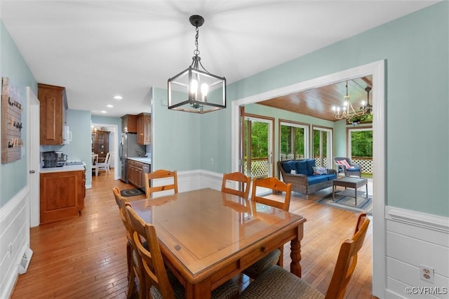 9140 Robin Ridge Dr, Hanover, VA 23116 - dining space with a chandelier, light wood-type flooring, wainscoting, and recessed lighting