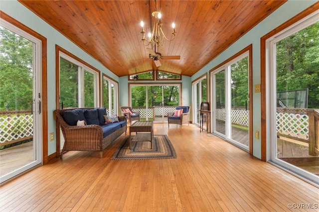 9140 Robin Ridge Dr, Hanover, VA 23116 - sunroom with outdoor lounge area, a ceiling fan, lofted ceiling, and a chandelier