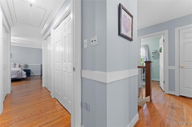 9140 Robin Ridge Dr, Hanover, VA 23116 - hall featuring attic access, an upstairs landing, light wood finished floors, ornamental molding, and baseboards