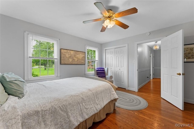 9140 Robin Ridge Dr, Hanover, VA 23116 - bedroom featuring wood finished floors, a closet, baseboards, and ceiling fan