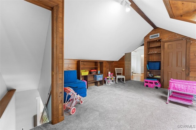 9140 Robin Ridge Dr, Hanover, VA 23116 - game room featuring wooden walls, lofted ceiling, and carpet