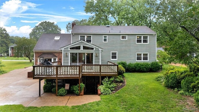 9140 Robin Ridge Dr, Hanover, VA 23116 - back of house featuring a wooden deck, a yard, and a chimney