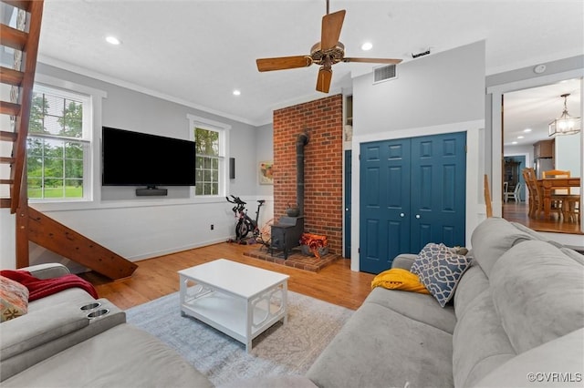 9140 Robin Ridge Dr, Hanover, VA 23116 - living room featuring healthy amount of natural light, wood finished floors, crown molding, a ceiling fan, and recessed lighting