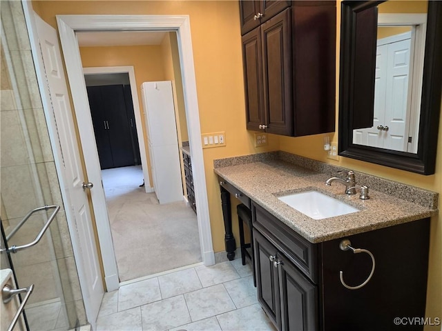9701 Waterfowl Flyway, Chesterfield, VA 23838 - bathroom featuring vanity, baseboards, and tile patterned floors