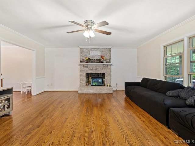 13610 Old Stage Rd, North Prince George, VA 23860 - living area with ceiling fan, wood finished floors, ornamental molding, and a fireplace