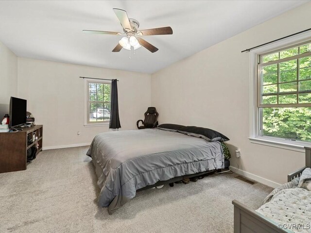 13610 Old Stage Rd, North Prince George, VA 23860 - carpeted bedroom with baseboards and ceiling fan