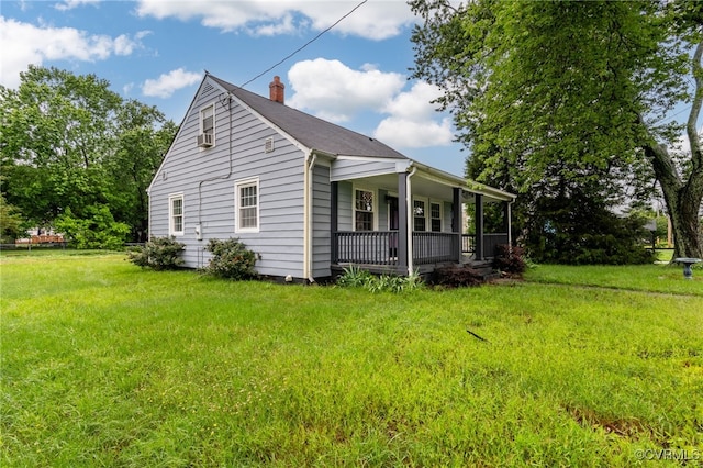 100 N Battery St, Henrico, VA 23075 - view of side of property with a porch, a chimney, and a lawn