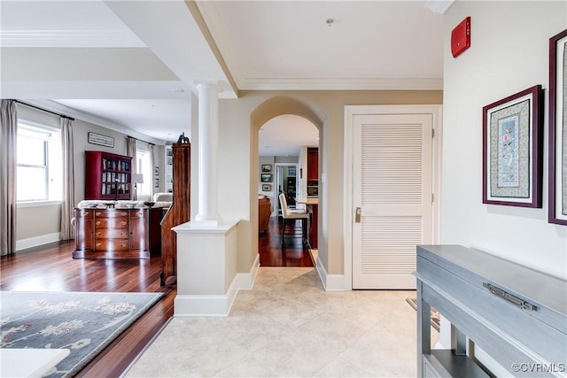 1350 Westwood Ave Unit 406, Richmond, VA 23227 - corridor with decorative columns, ornamental molding, arched walkways, baseboards, and light tile patterned floors