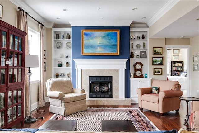 1350 Westwood Ave Unit 406, Richmond, VA 23227 - living area featuring dark wood-style floors, built in shelves, a fireplace, ornamental molding, and baseboards