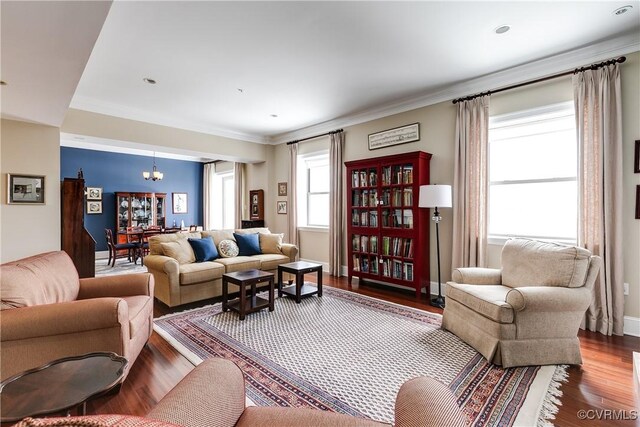 1350 Westwood Ave Unit 406, Richmond, VA 23227 - living room featuring a chandelier, dark wood-style floors, crown molding, and baseboards